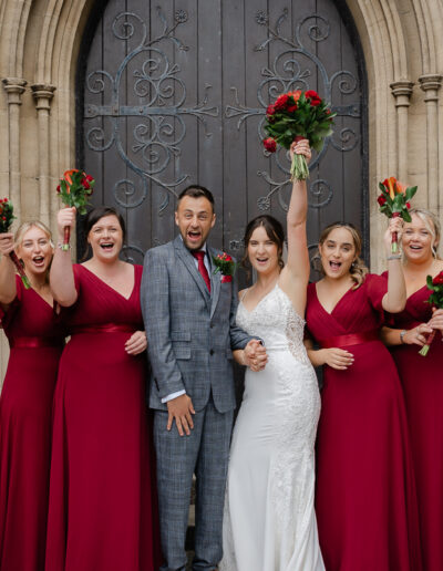 bridal party have fun during their group photos