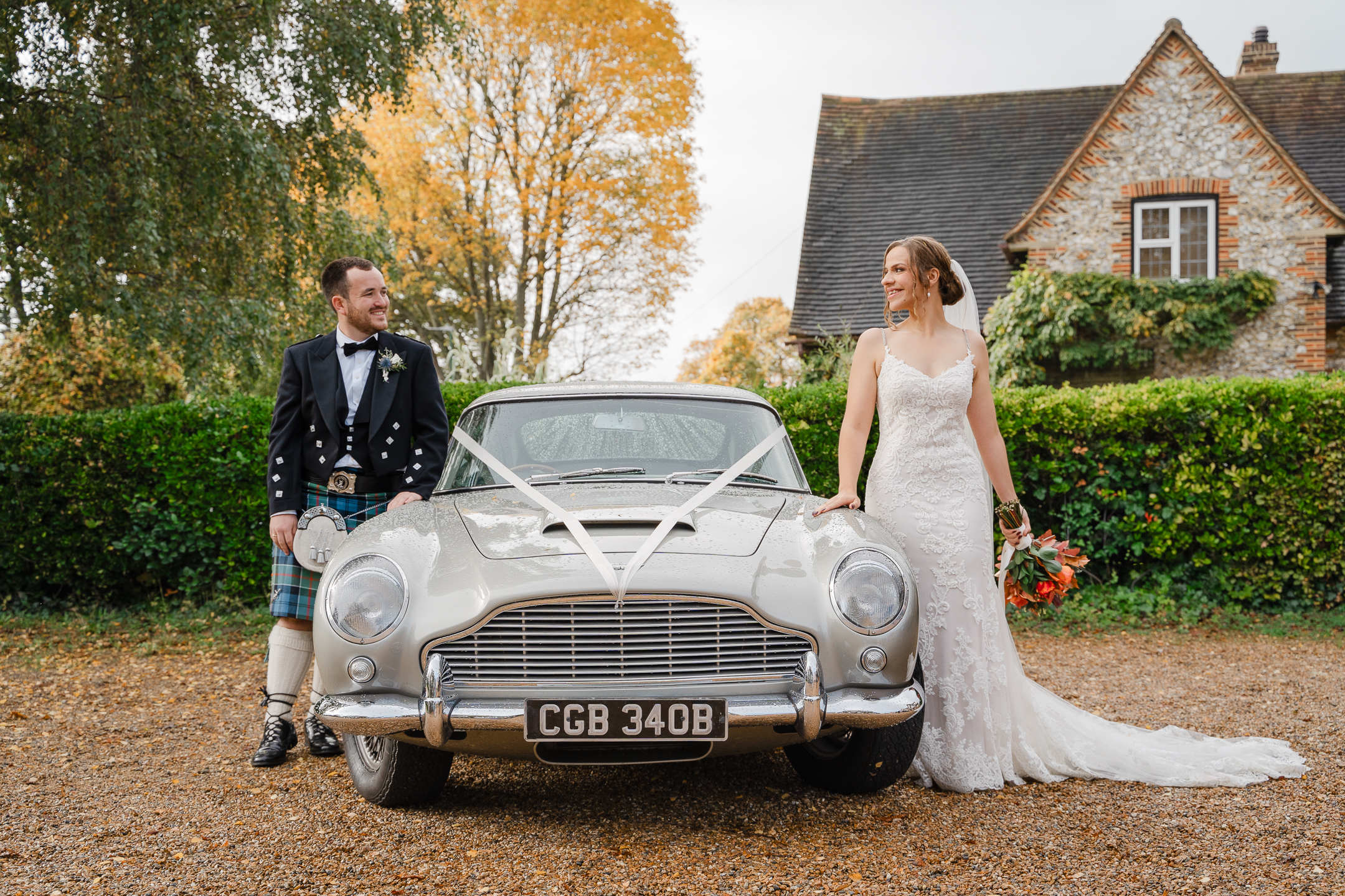 wedding couple has a love for vintage cars