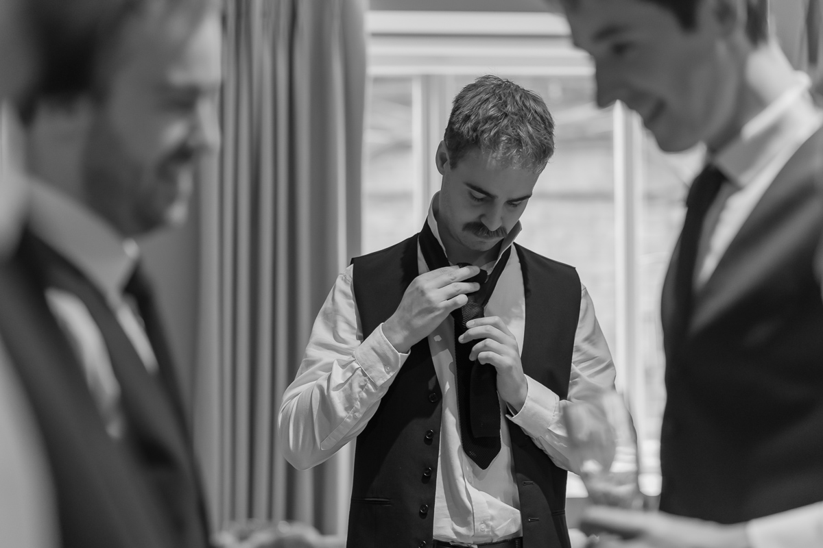 Groom get ready with his groomsmen