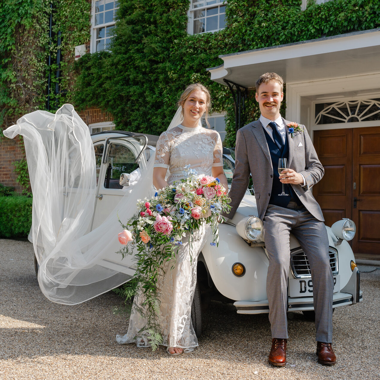 Classic cars and wedding couples in Surrey