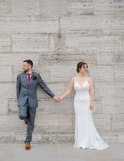 married couple in love posing at the stone wall in portsmouth