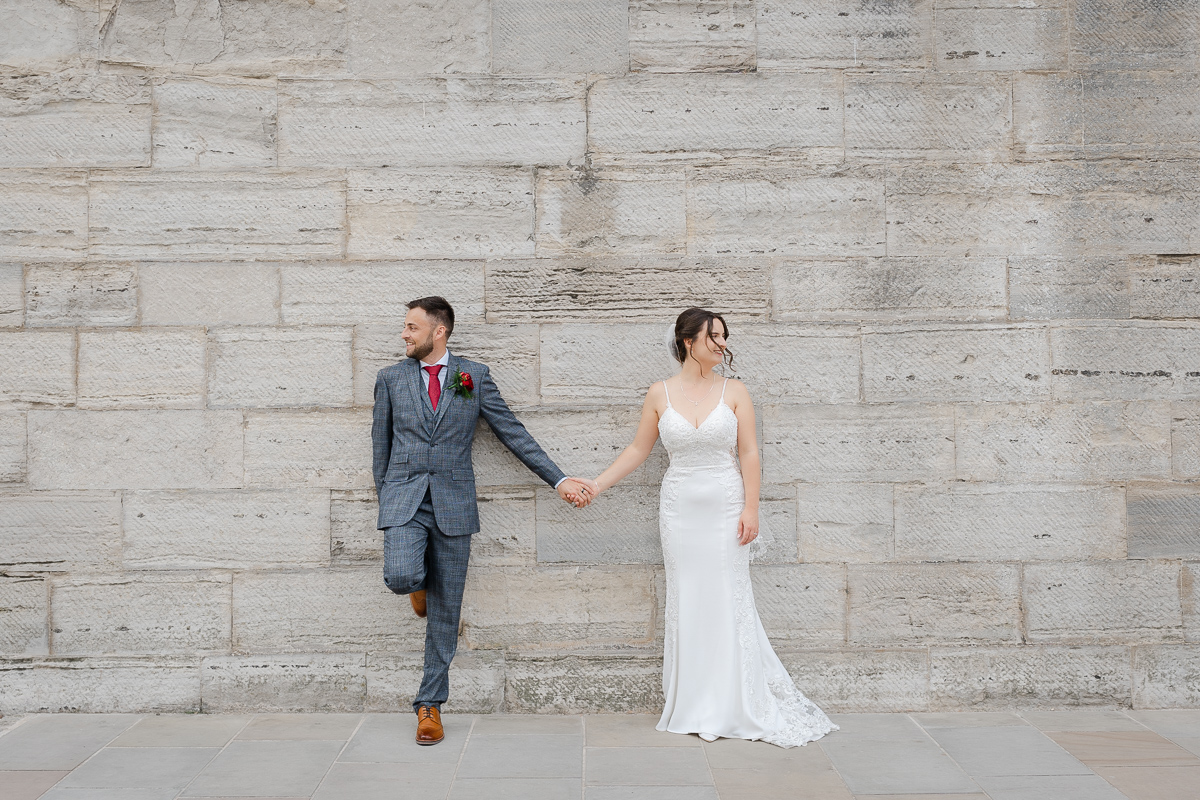 married couple in love posing at the stone wall in portsmouth